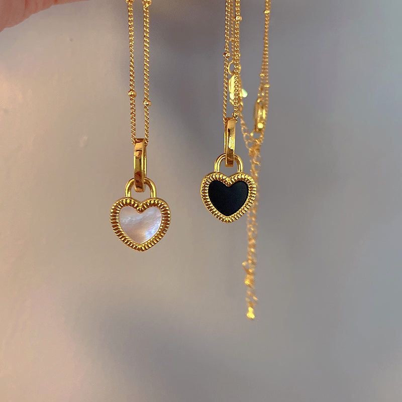 Reversible heart necklace